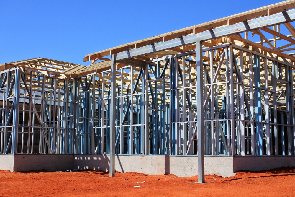 Australia imports millions of metric tons of steel, aluminium, concrete and glass - used in structural frameworks, reinforcing bars (rebar), foundations, walls, floors, windows, facades, and interior applications - with carbon tariffs as the country doubles down on its carbon targets. (Photo Credit: 2196235695 via Shutterstock Images)